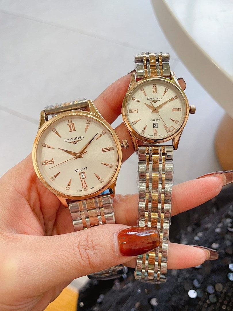 Longines watch pair with gold-tone metal bracelets and cream round dials