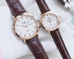 Longines quartz wristwatch set with brown leather straps and white dials