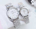 Longines quartz wristwatch set with silver metal bracelets and white dials