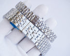 Longines quartz wristwatch with stainless steel bracelet and silver case, blue accent detail