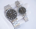 Longines quartz wristwatch with stainless steel bracelet and black dial, silver bezel