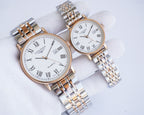 Pair of Longines quartz wristwatches with rose-gold cases, white dials, stainless bracelets