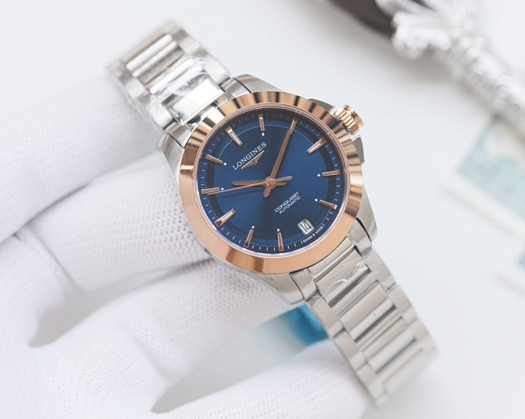 Longines watch with dark blue dial and silver stainless bracelet, round case
