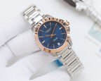 Longines watch with dark blue dial and silver stainless bracelet, round case