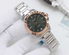 Longines watch with dark green dial and silver stainless bracelet, round case