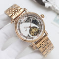 Longines wristwatch, gold-tone mesh bracelet and white dial with open-heart skeleton movement