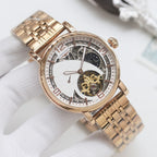 Longines wristwatch, gold-tone mesh bracelet and white dial with open-heart skeleton movement