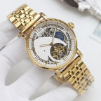 Longines wristwatch, gold-tone metal bracelet and white dial with skeleton movement details