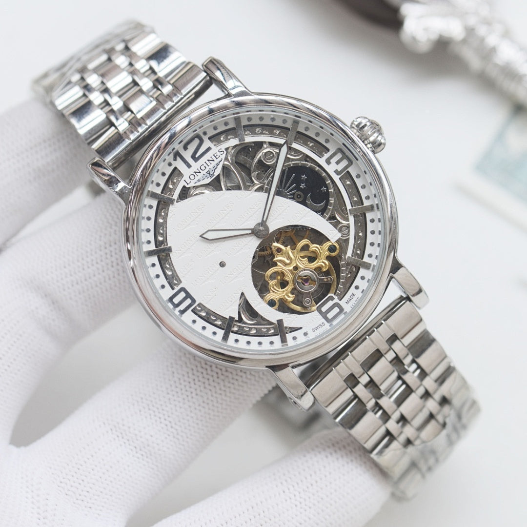 Longines wristwatch, silver-tone metal bracelet and white dial with visible mechanical balance wheel