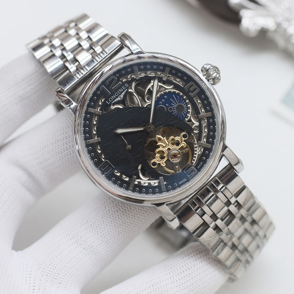 Longines wristwatch, silver-tone metal bracelet and dark dial with gold-tone skeleton movement