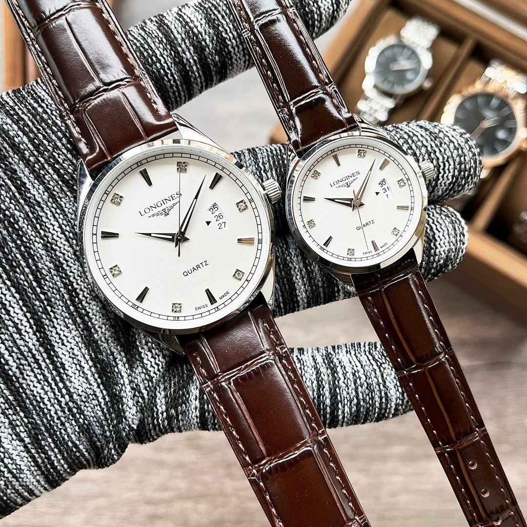 Pair of Longines quartz watches with white dials and brown leather straps