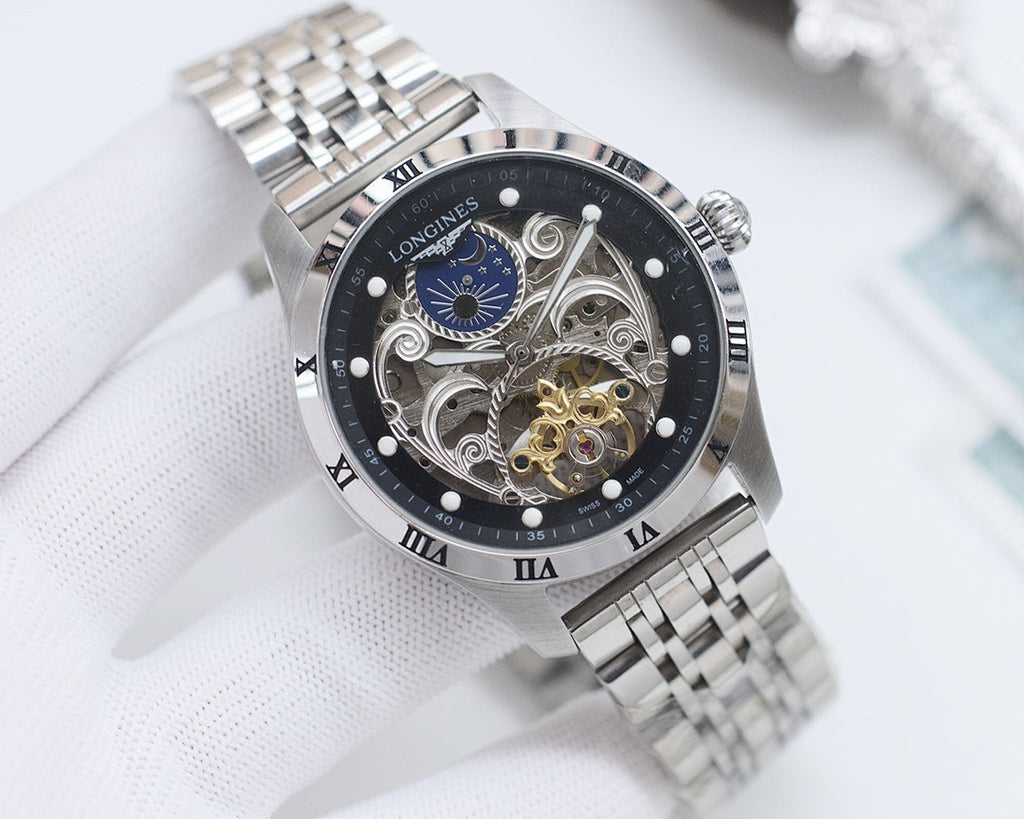 Longines watch with silver tone bracelet and round black skeleton dial with blue moon detail