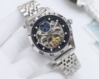 Longines watch with silver tone bracelet and round black skeleton dial with blue moon detail