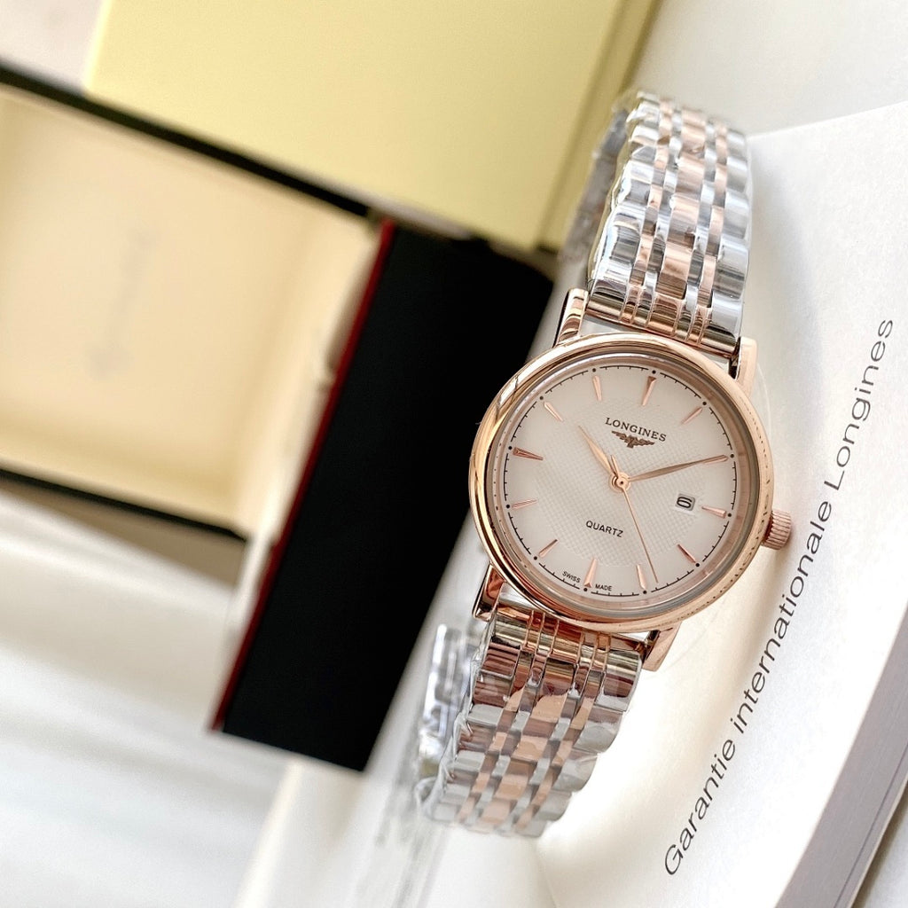 Rose gold-tone wristwatch with white dial, round case, metal link bracelet strap