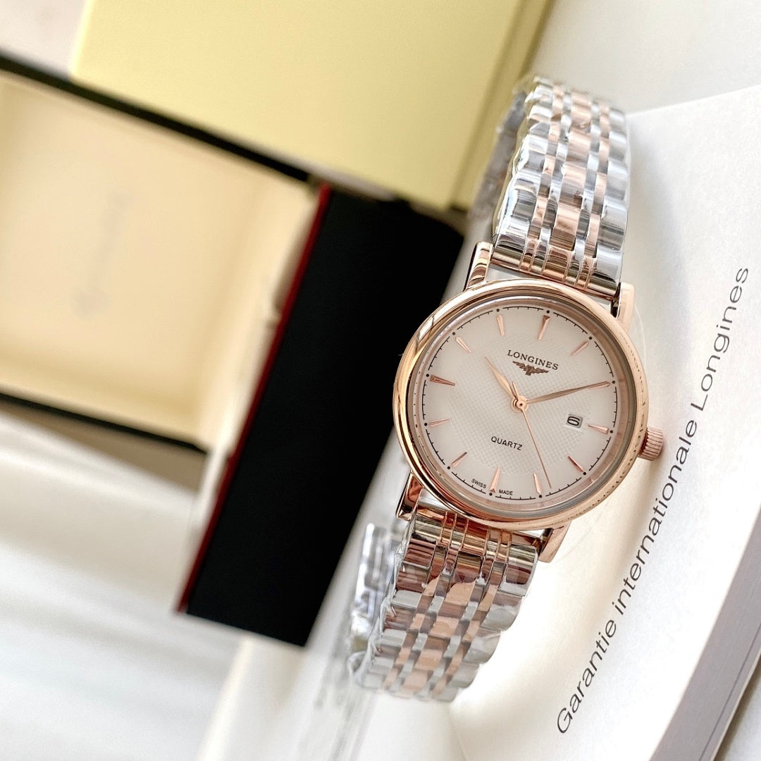 Rose gold-tone wristwatch with white dial, round case, metal link bracelet strap