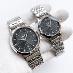 Longines watch: silver metal bracelet, dark dial with markers; paired second watch