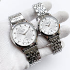 Longines watch: stainless-look bracelet, white dial; paired second watch matching