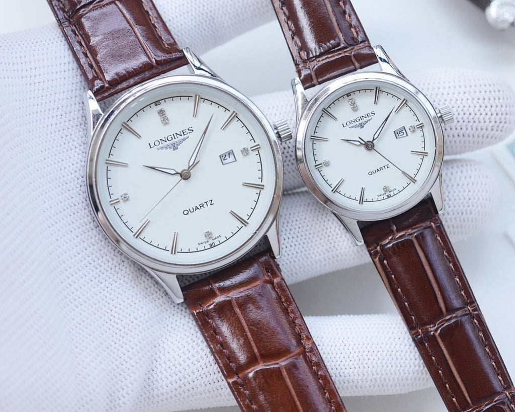 Longines quartz watches with white dials and silver cases with brown leather straps