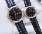 Longines quartz watches with black dials and navy leather straps