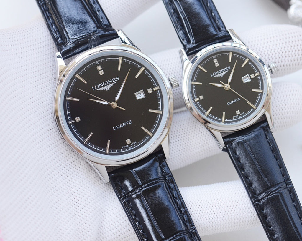 Longines quartz watches with black dials and silver cases with navy leather straps