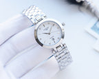 Longines round watch with white dial and silver metal bracelet
