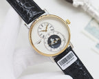 Gold-trim wristwatch with black crocodile-style leather strap, white dial, world map subdial