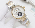 Two-tone metal wristwatch with gold bezel, white dial, world map subdial, date markers