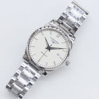 Silver-tone Longines wristwatch with white dial and polished metal link bracelet