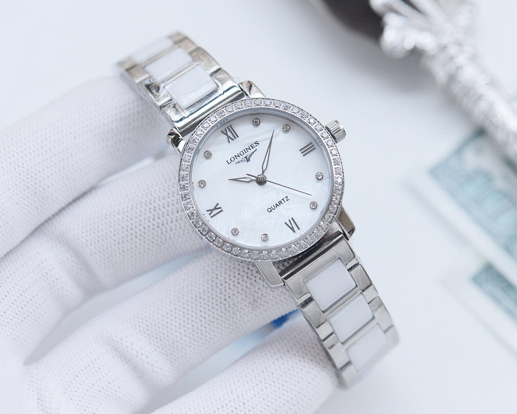 Longines watch with silver metal link bracelet, white dial, crystal-studded bezel