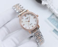 Longines rose-tone watch with crystal-studded bezel, white dial, metal link bracelet
