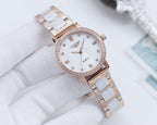 Longines rose-tone watch with white dial and metal link bracelet, crystal bezel