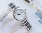 Longines wristwatch with rose-gold case and silver bracelet with dark center links