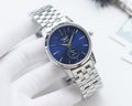 Longines watch with blue dial and steel link bracelet, round silver case