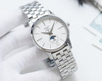 Longines watch with white dial and steel link bracelet, round silver case