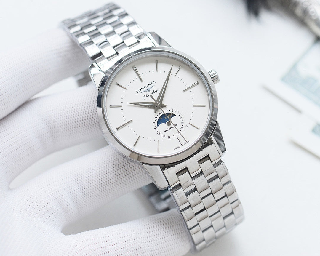 Longines watch with white dial and steel link bracelet, round silver case