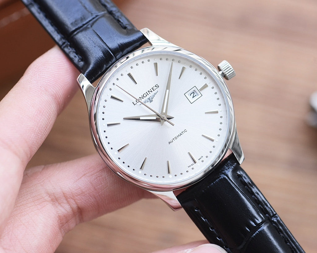 Longines automatic watch with white dial, silver-tone case, and black leather strap