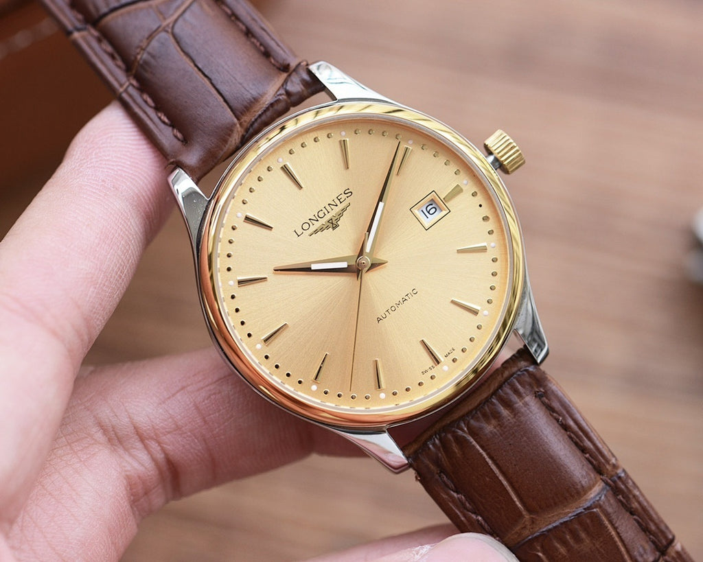 Longines automatic watch with gold-tone dial, gold-tone case, and brown leather strap