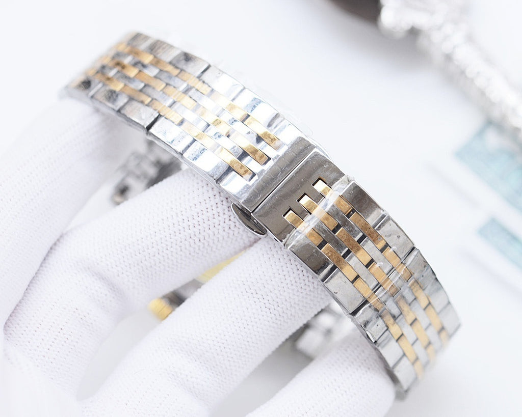 Longines two-tone watch bracelet and clasp, silver links with gold accents