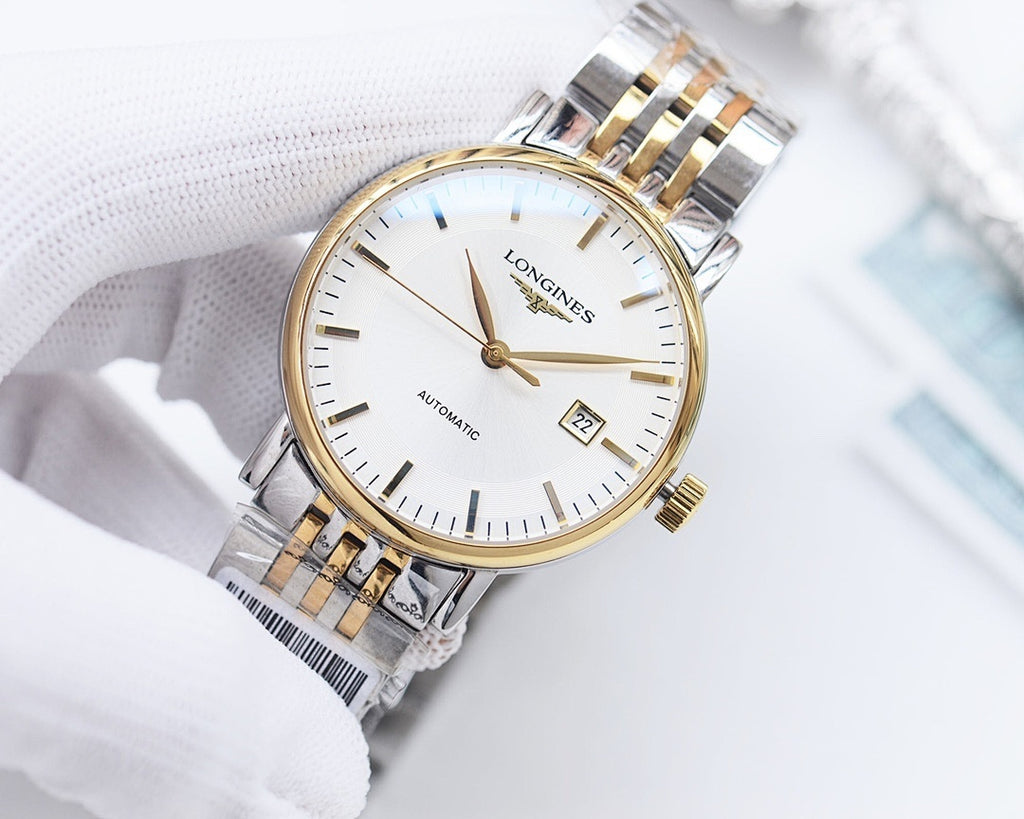 Longines two-tone automatic watch with white dial, gold hands, and date window