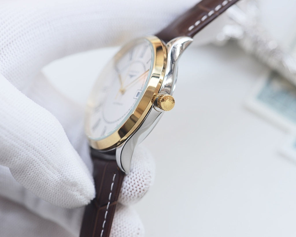 Longines wristwatch with silver case and dark leather strap, side view with crown