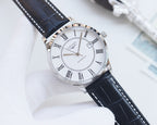Longines wristwatch with white dial and Roman numerals, silver case, dark leather strap