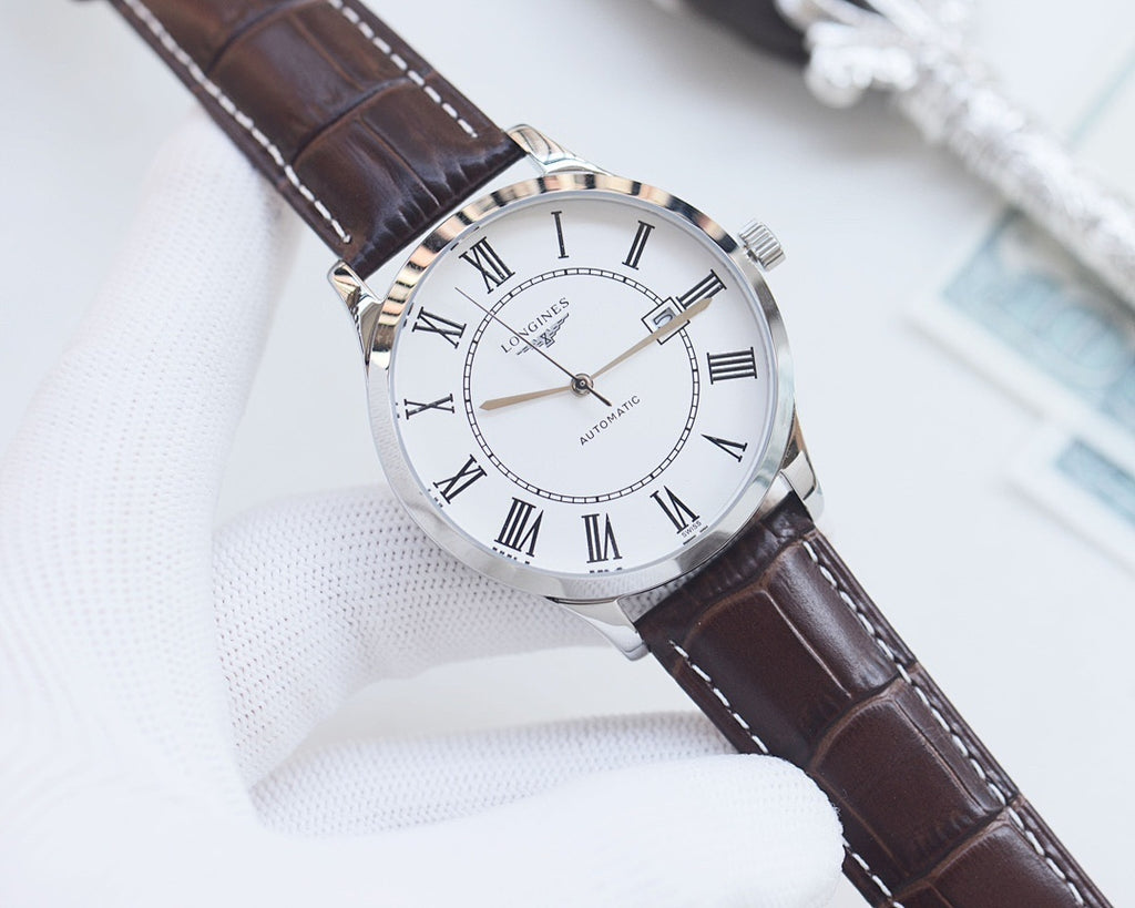 Longines wristwatch with white dial, Roman numerals, silver case, dark brown leather strap