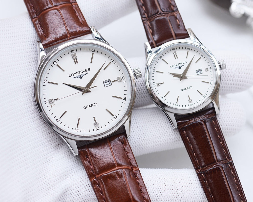 Longines quartz watch pair with brown leather straps, white dials, gold-tone cases
