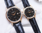 Longines quartz watch pair with dark dials, navy leather straps, rose-gold tone cases