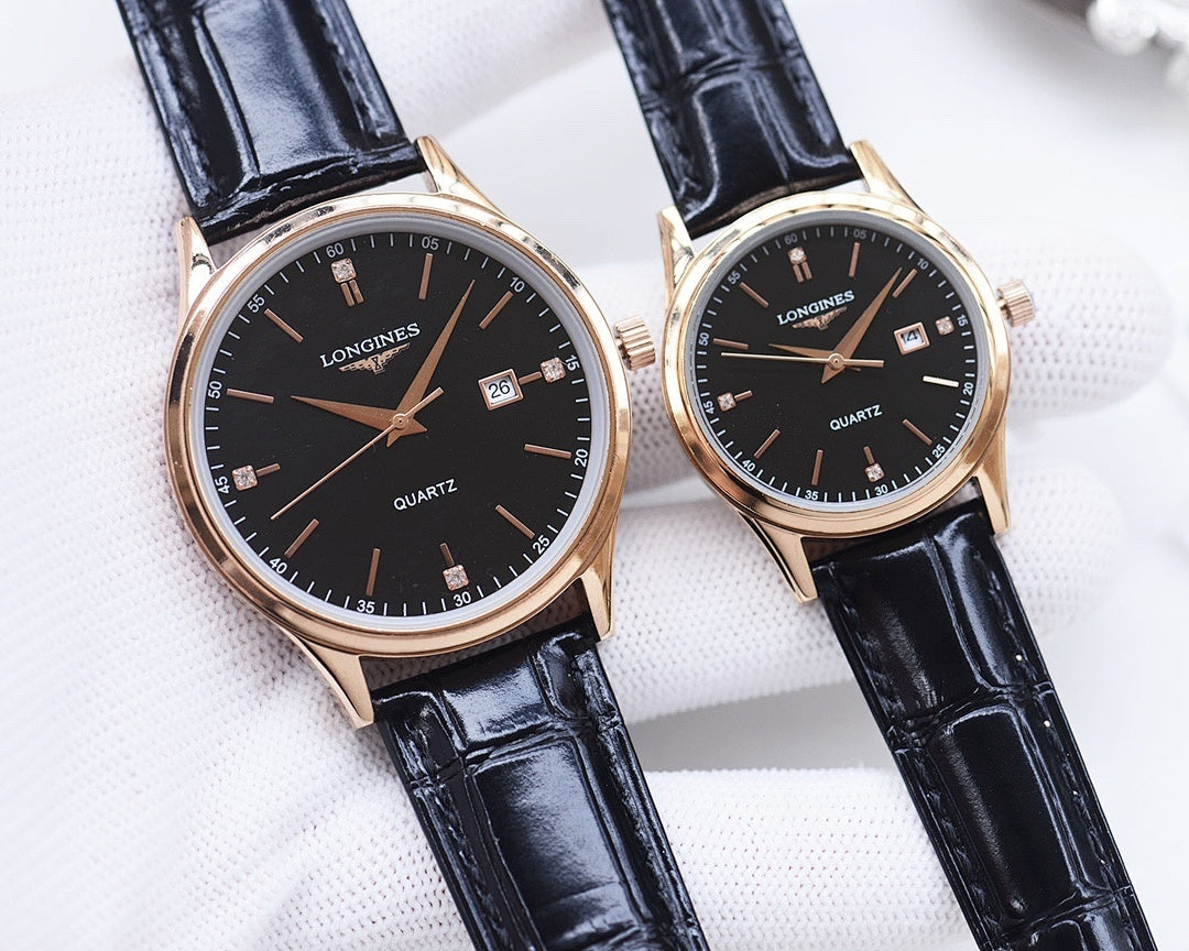 Longines quartz watch pair with dark dials, navy leather straps, rose-gold tone cases