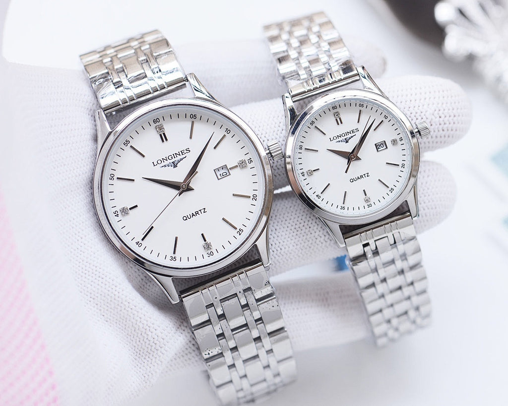 Longines quartz watch with silver metal bracelet and white dial, two watches shown