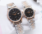 Longines quartz watch pair with black dials, silver bracelet, rose-gold tone cases