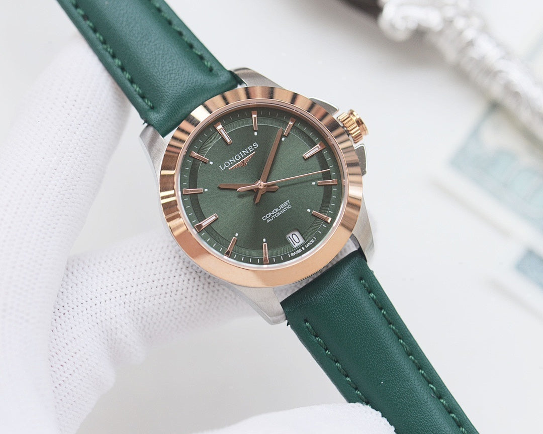 Round wristwatch with dark green dial and green leather strap, silver bezel