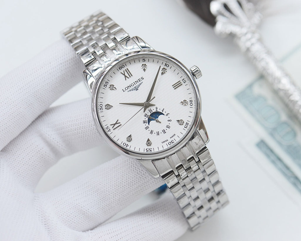 Longines watch with white dial, roman numerals, and stainless steel link bracelet