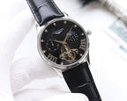 Longines wristwatch with silver case, black dial, black leather strap